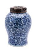 A Chinese blue and white baluster jar and one other: painted with phoenix amongst berries and peony