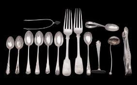 A mixed collection of silver flatwares, various makers and dates: includes sugar tongs,