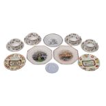 A collection of five 19th century pottery nursery plates and four child's cups and saucers: the