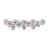 A group of twelve Bristol coffee cups: painted with floral sprays and garlands,