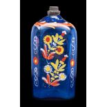 A Central European blue glass flask: of canted rectangular form,