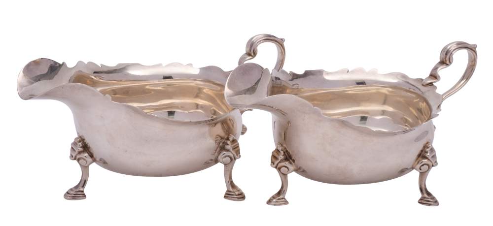 A pair of George V Britannia silver sauce boats, maker Goldsmiths & Silversmiths Co Ltd, London,