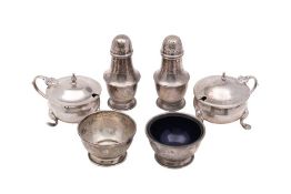 A mixed lot of silver condiments, various makers and dates,: includes two mustard pots,