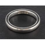 A platinum band ring,: with partial hallmarks for London, ring size K, total weight ca. 4.