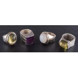 Four gemset rings,: including moonstone, amethyst and peridot, ring sizes O-R, total weight ca. 99.