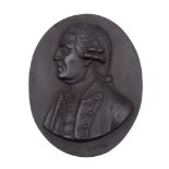 A Wedgwood & Bentley black basalt portrait medallion of Augustus,