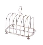 A Victorian silver six division toast rack, maker Holland, Son & Slater, London,