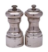 A pair of Elizabeth II silver salt and pepper mills, maker David Shaw Silverware Ltd, London,