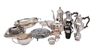 A quantity of assorted silver plate wares: including entree dishes three-piece tea service,