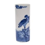 A small Chinese blue and white sleeve vase: painted with a sea eagle perched on a rocky outcrop