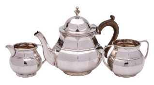 A George V silver three-piece silver tea service, maker's mark worn,