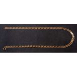 A 9ct. gold flattened curb-link necklace,: stamped '9KT', length ca. 45cm, total weight ca. 19.4gms.