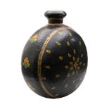 A large Indian painted tin moon-shaped vase: with all over floral decoration to a black ground,