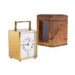 An Edwardian French carriage alarm clock: the eight-day duration timepiece movement having a