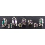 Eight gemset rings,: including amethyst, green chalcedony, aventurine quartz and peridot,