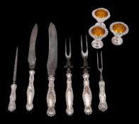 A matched silver handled carving set, stamped Sterling: includes two carving knives,