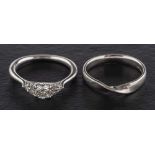Two platinum rings,: including a round, brilliant-cut diamond ring,