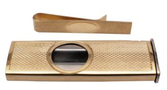 A 9ct Gold cigar cutter, Birmingham, 1924: of rectangular outline with steel blade,