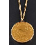 A Krugerrand gold coin pendant,: the coin dated 1974, the mount 9ct gold,