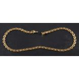 A 9ct gold panther-link chain necklace,: stamped 'ITALY' with import marks for Birmingham,