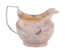 A George III silver cream jug, maker I.
