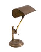 A 1920's GEC adjustable table lamp: with hooded shade on an adjustable column and weighted circular