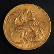A George V gold sovereign coin, 1915,: diameter ca. 22mms, total weight ca. 8gms.