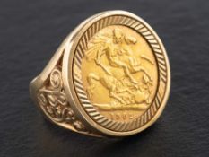 An Edward VII, half sovereign gold coin ring,: the coin dated 1902, the mount 9ct gold,