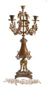 A Victorian gilt metal four branch candelabrum:,