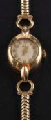 A Marvin dress wristwatch,; the dial with Arabic numerals, the case stampd '375',
