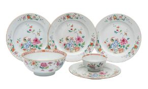 A set of four Chinese famille rose plates and two similar bowls: variously painted with peony,