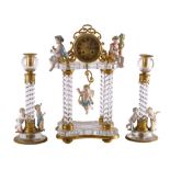 A Continental glass and porcelain Victorian mantel clock: the eight-day duration movement having a