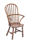 A Victorian elm, ash and beech child's Windsor elbow chair, second half 19th century,