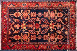 A Caucasian rug:, the shaded field with an all over geometric design,