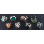 Eight gemset rings,: including moss agate, chalcedony, agate, moonstone, carnelian and spectrolite,