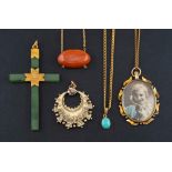 Five pendants,: including a nephrite cruciform pendant, length ca. 6.