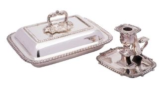 An early 19th Century Sheffield Plate chamberstick: of rectangular outline with beaded and