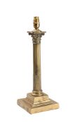A brass Corinthian column table lamp: with foliate capitol on a stop fluted column and stepped