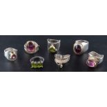 Eight gemset rings,: including pink tourmaline, peridot, and synthetic pink spinel,