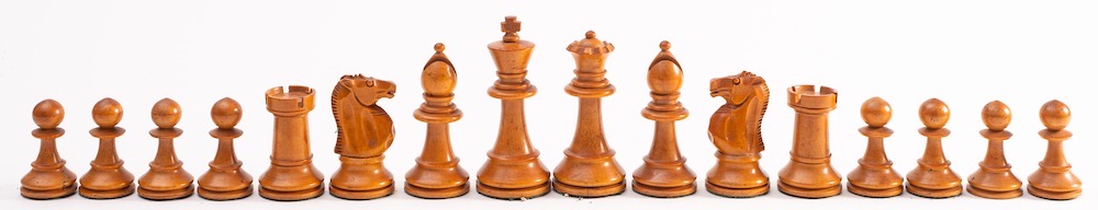 A Staunton pattern boxwood and ebonised chess set: the king, 9cm high, the pawn 4.5cm high.