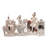 A group of four Victorian Staffordshire flatback pottery figures: comprising Napoleon,