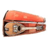 A late 19th century rosewood and mother or pearl mandolin by Luigi Poppi,