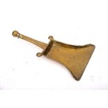 A late 18th/early 19th Century brass shovel scoop: the handle with spirally reeded ball finial.