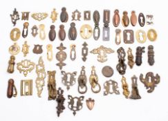 A collection of various 19th century and later brass escutcheons;