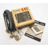 A British Telecom Inphone CT6000 Moneybox telephone with instruction booklet (no key)