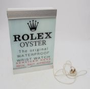 An illuminated 'Rolex Oyster' display sign by Electro Graphic,