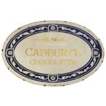 An early 20th century 'We Sell Cadbury's Chocolates' oval advertising mirror,