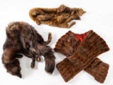 Two mid 20th century fur stoles and a cape.