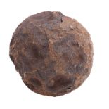 A 10lb cannon ball, origin unknown, 15cm diameter.