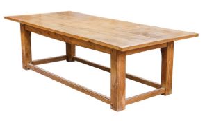 An oak refectory dining table: of large size,